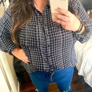 Black and white button down top.